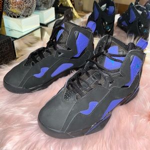 Black and purple Jordan’s